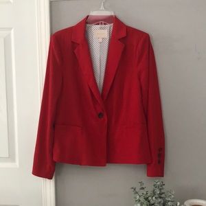 Red Blazer with white polkadot lining.